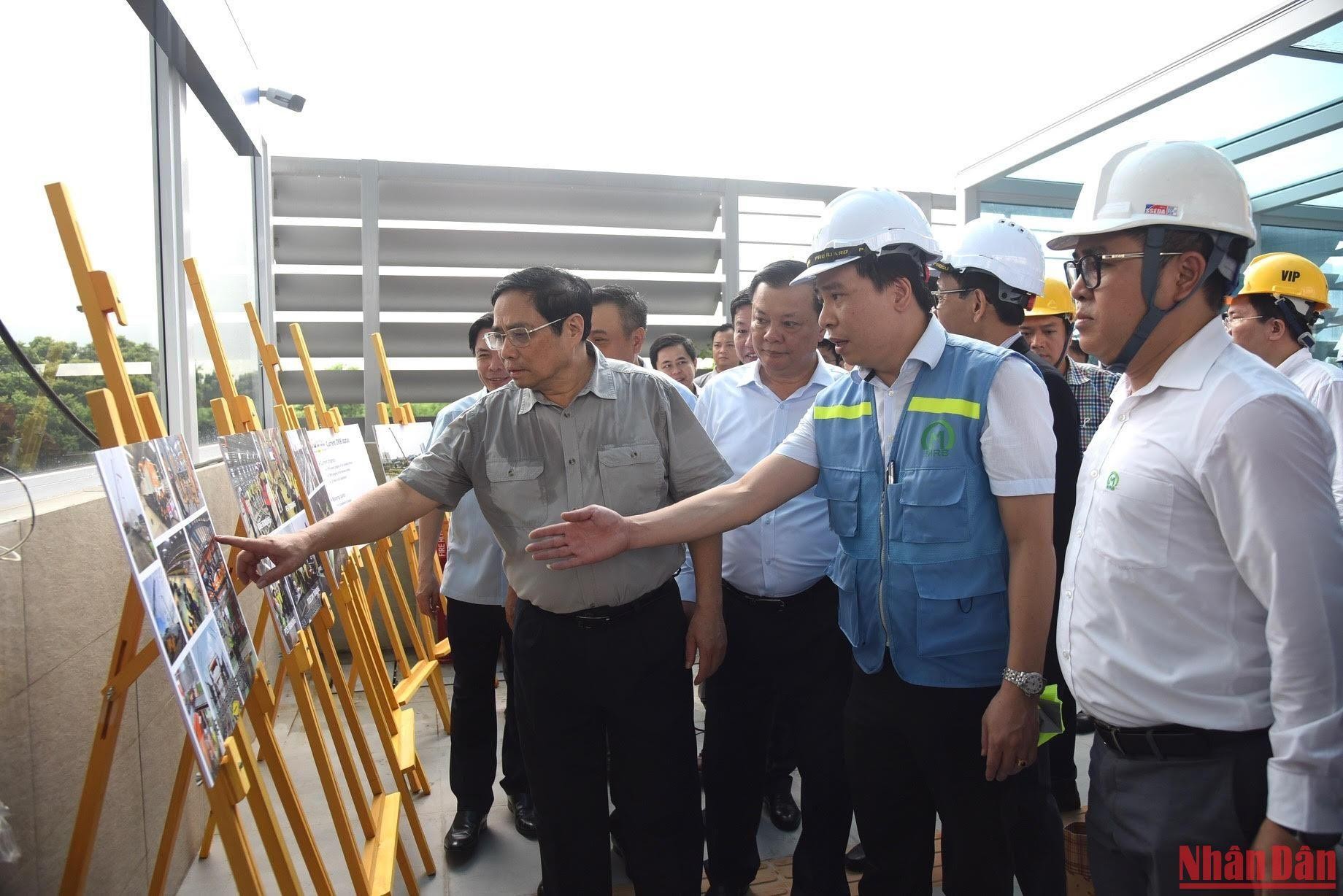 Thủ tướng Phạm Minh Chính kiểm tra tiến độ Dự án đường sắt đô thị Nhổn-Ga Hà Nội ảnh 5