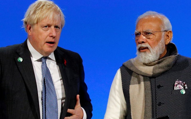 Thủ tướng Anh Boris Johnson và Thủ tướng Ấn Độ Narendra Modi tham dự một cuộc họp trong khuôn khổ Hội nghị thượng đỉnh Liên hợp quốc về biến đổi khí hậu (COP26) diễn ra tại Glasgow, Scotland, Vương quốc Anh ngày 2/11/2021. (Ảnh: Reuters)
