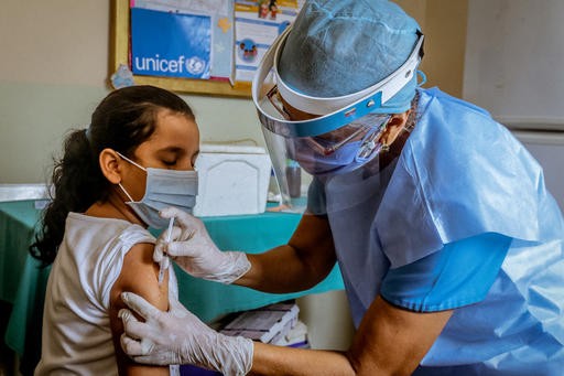 iêm chủng cho trẻ em tại Venezuela (Ảnh: William Urdaneta/UNICEF).