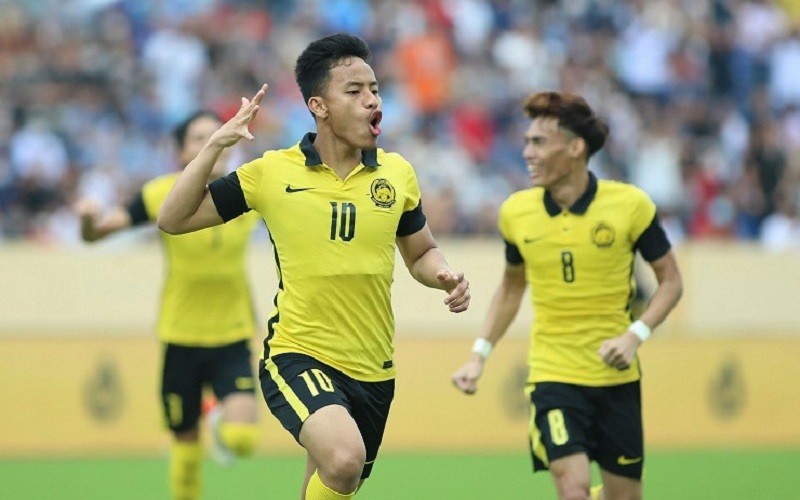 Tiền đạo Luqman Hakim ăn mừng sau khi ghi bàn thắng mở tỷ số cho U23 Malaysia. (Ảnh: 24h.com.vn)