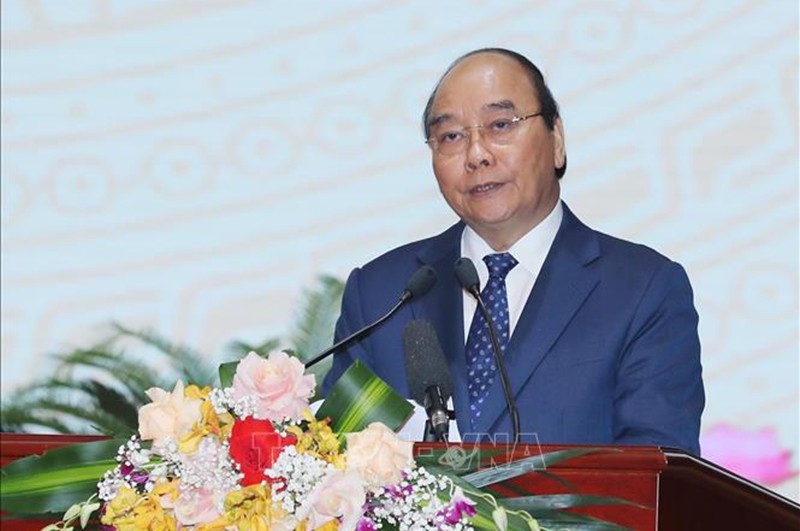 Chủ tịch nước Nguyễn Xuân Phúc phát biểu tại lễ trao Giải thưởng Hồ Chí Minh về khoa học, công nghệ lĩnh vực quân sự, quốc phòng. (Ảnh: Trọng Đức/TTXVN)