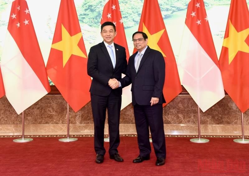 Thủ tướng Chính phủ Phạm Minh Chính tiếp Chủ tịch Quốc hội Singapore Tan Chuan-Jin đang thăm chính thức Việt Nam. (Ảnh: TRẦN HẢI)