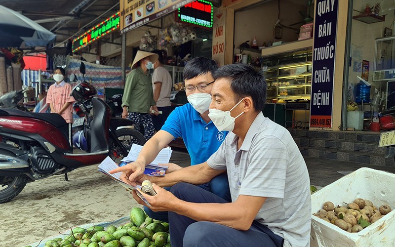 Truyền thông chính sách bảo hiểm xã hội tới người lao động tự do tại tỉnh Hà Tĩnh. (Ảnh Trung tâm)