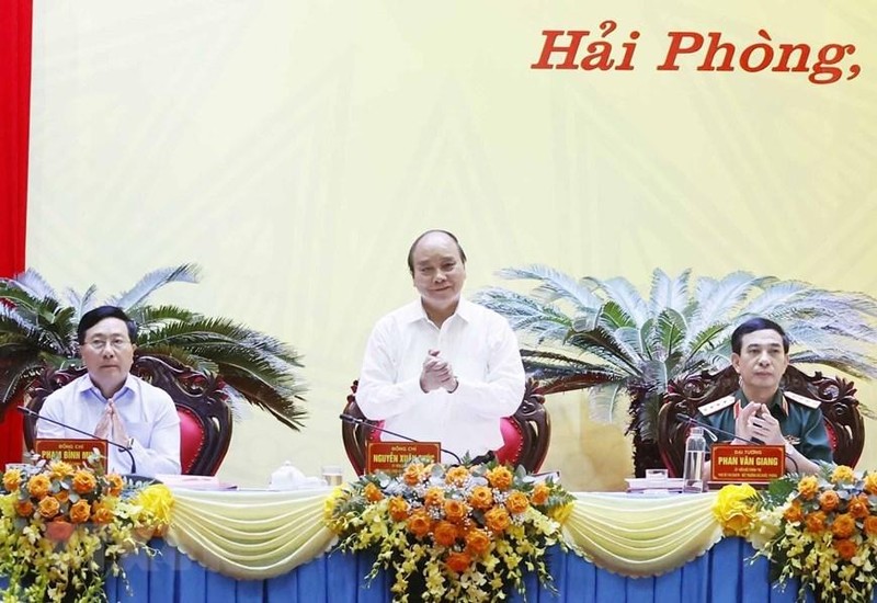 Chủ tịch nước Nguyễn Xuân Phúc chủ trì hội thảo. (Ảnh: TTXVN)