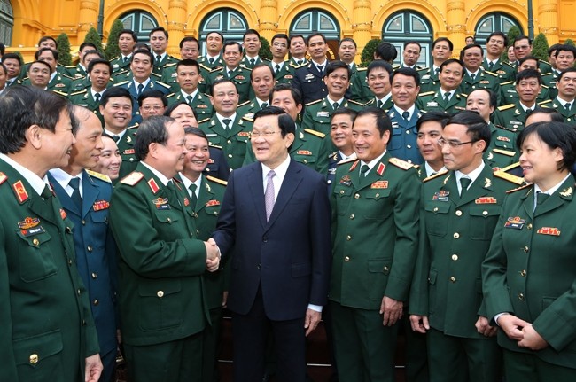 Chủ tịch nước Trương Tấn Sang với các đại biểu. Ảnh: NGUYỄN KHANG (TTXVN)